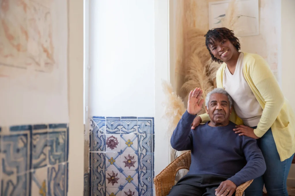 adult child visiting elderly parent during first week in assisted living