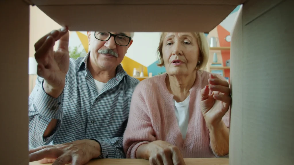 family downsizing and organizing belongings before parent's move to assisted living