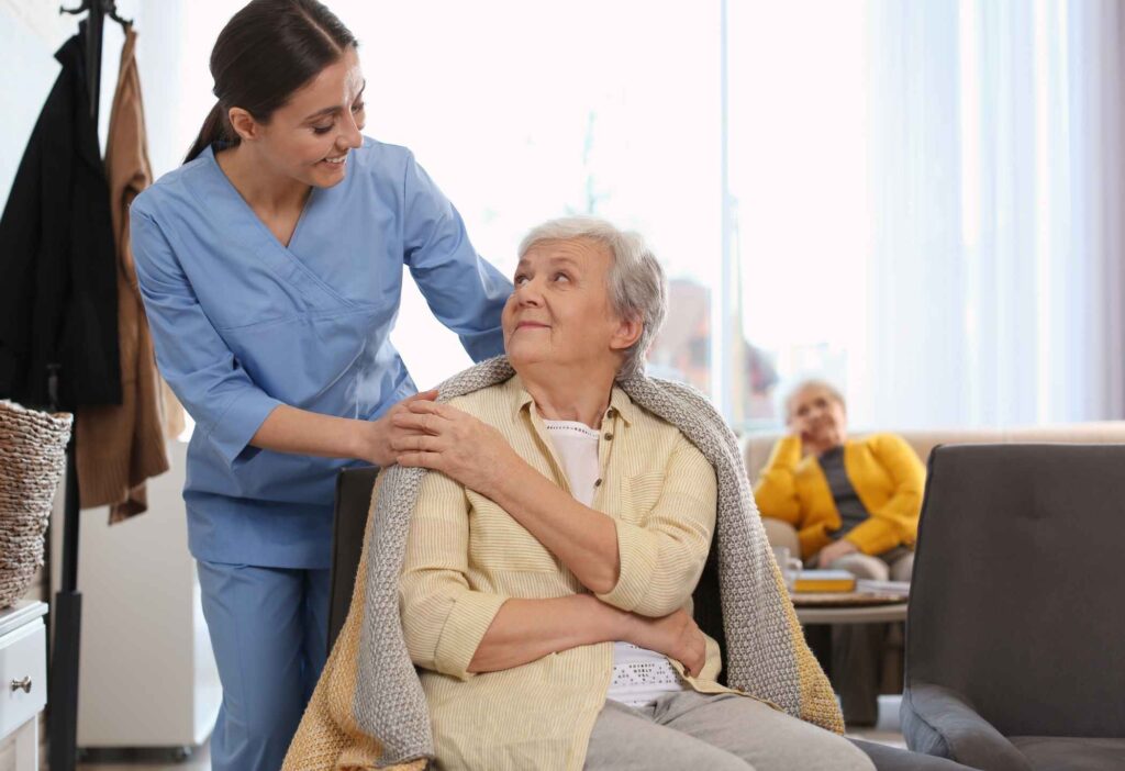 Hospice nurse offering guidance and support to a family